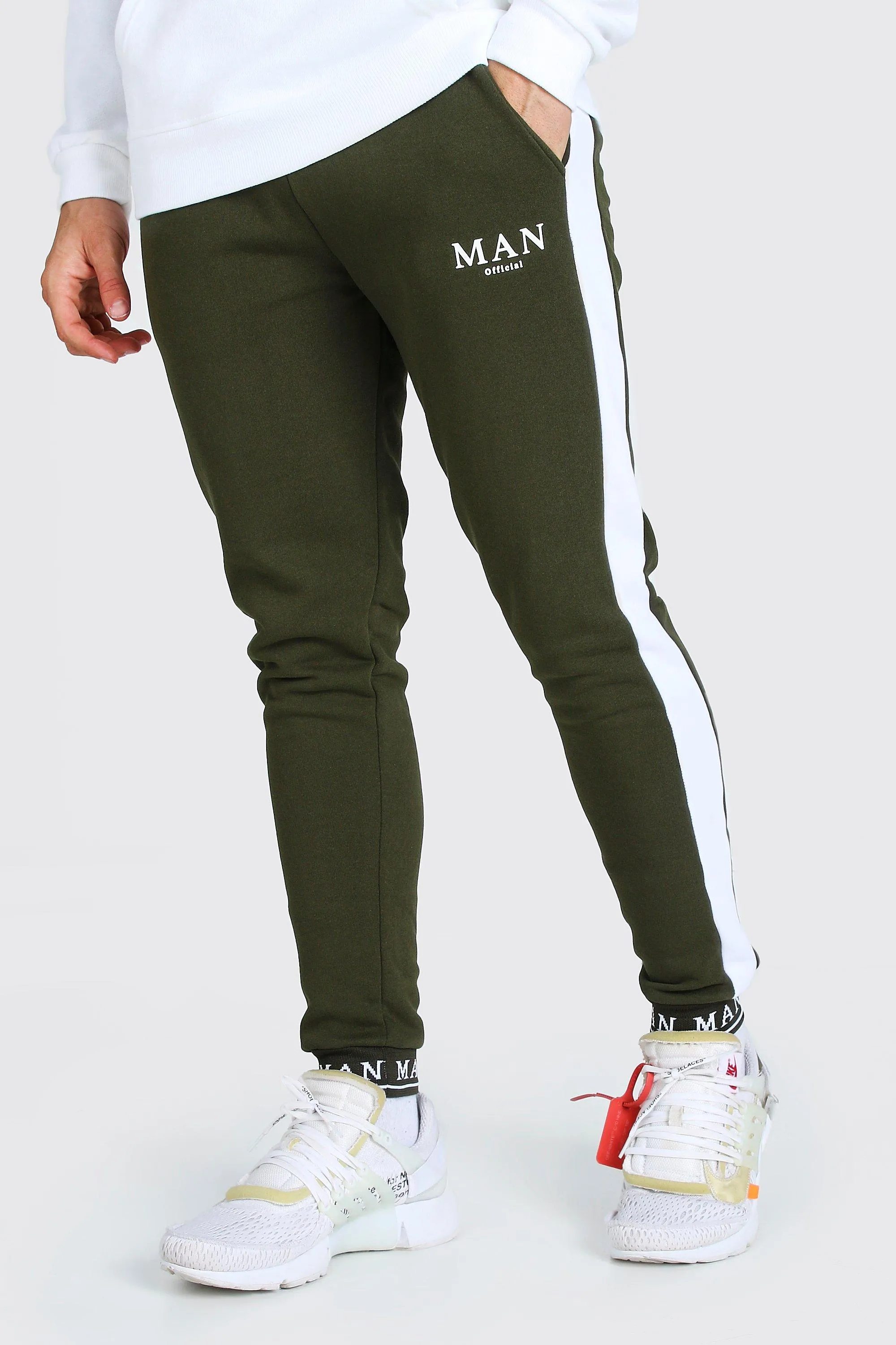 Man Embroidered Cuff Side Panel Skinny Joggers | boohooMAN UK