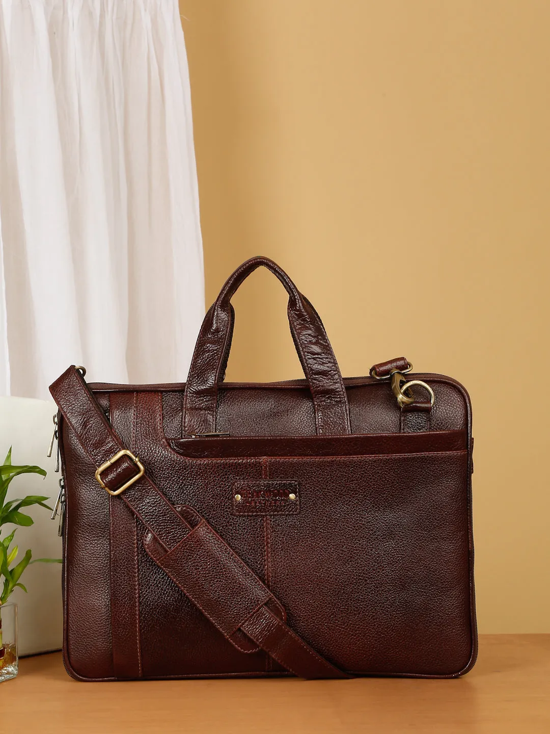 Unisex Brown Leather taxtured laptop Bag